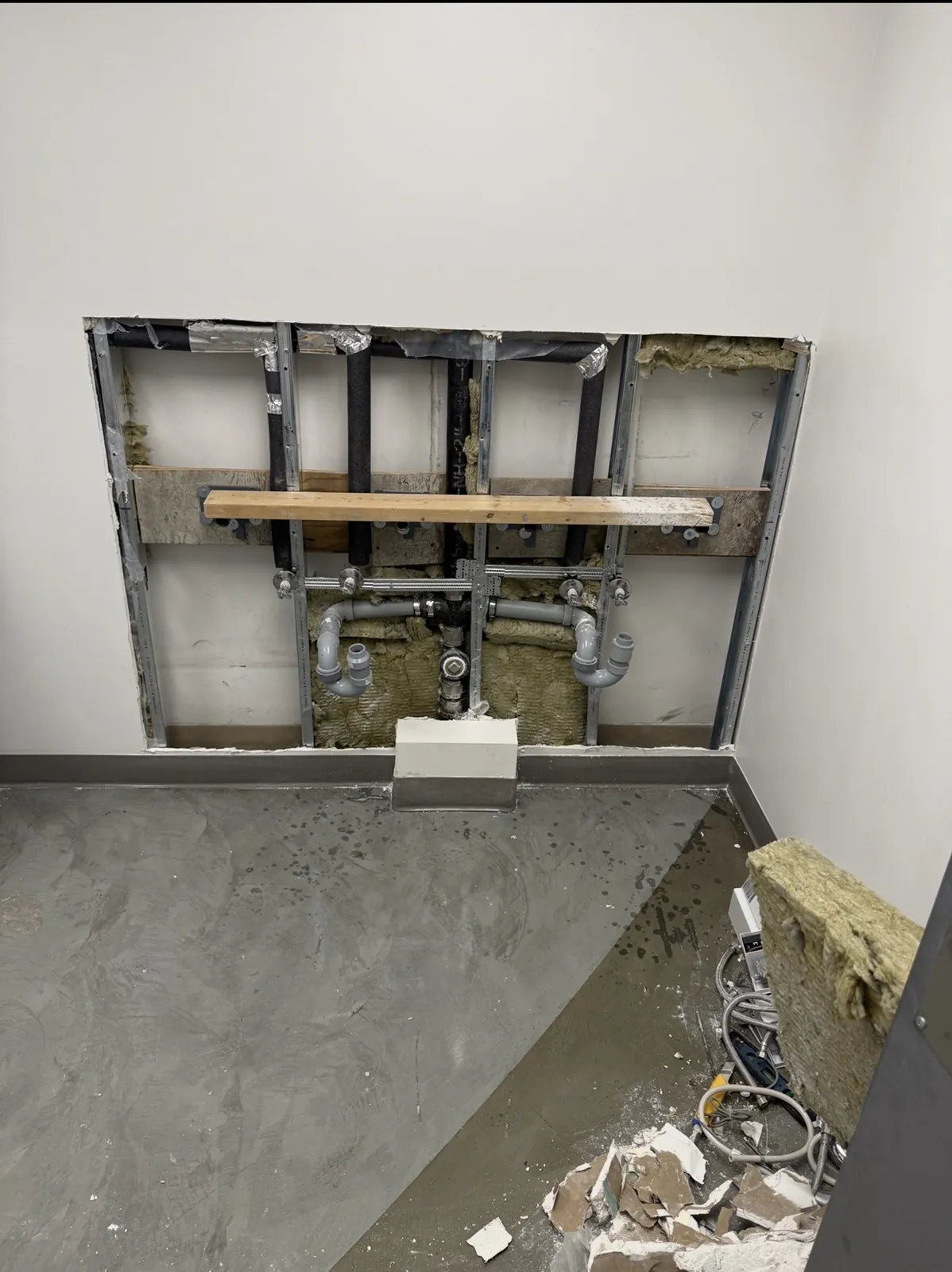Washroom sink renovation in progress at the MAPEI commercial renovation.